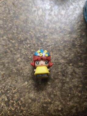 Mattel Red-Haired Mini Figure with Yellow Outfit and Blue Accents